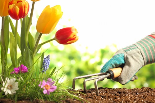 Gardeners working responsibly with protective measures